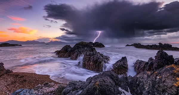 A storm at a beach looking out to the ocean